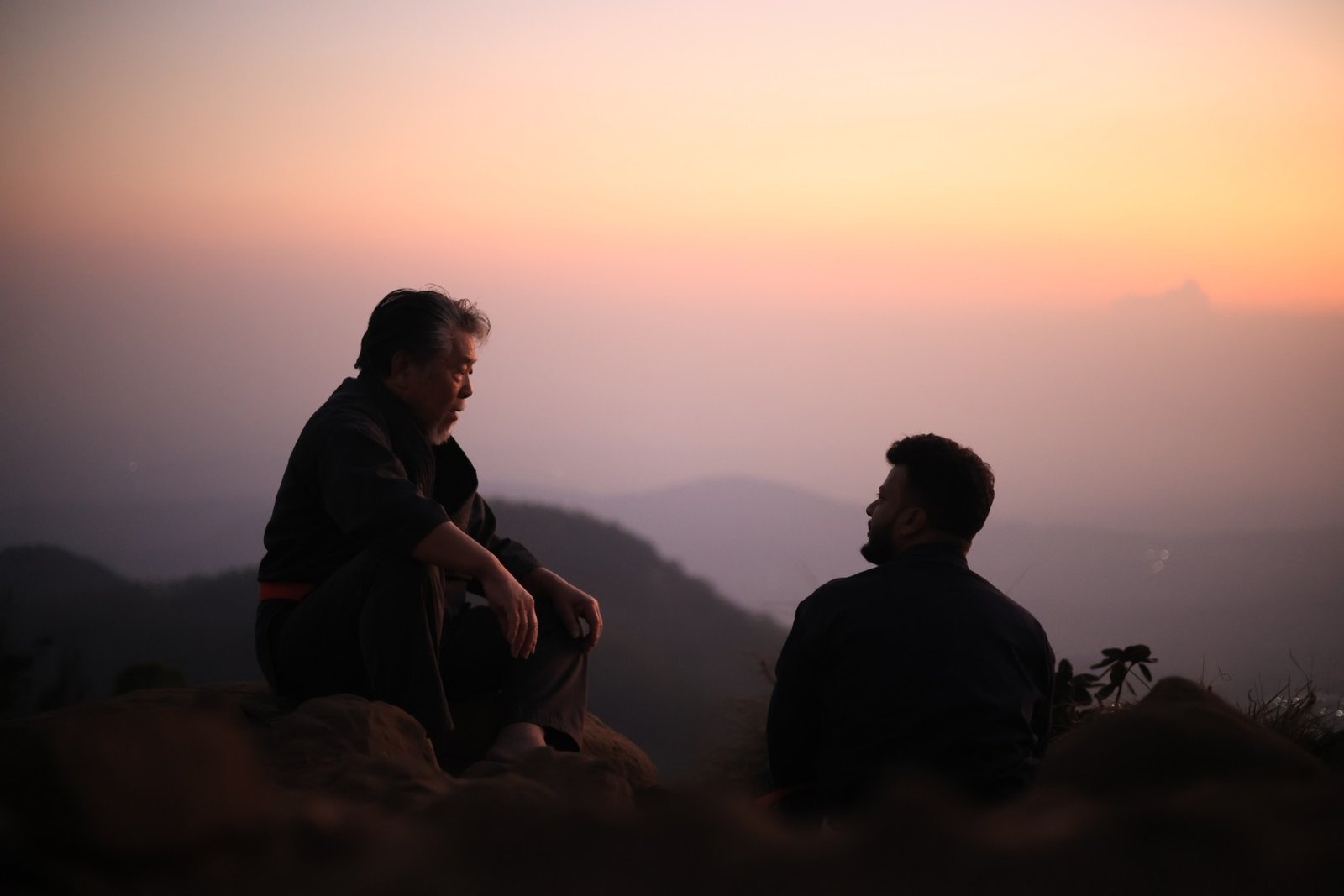 hanshi tetsuo takamiyagi teaching student lince ravi the profound techniques of udunti and meditation. (large)
